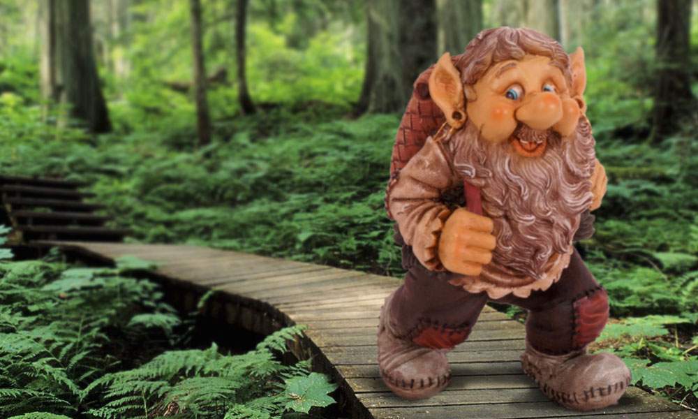 A smiling troll walks down a wooden pathway through the woods./>

<p>Mr. Bridgewater, a most refined troll, had taken to living in a cottage rather than under a bridge. You
see, the years of living a wild troll's life-- terrorizing goats, bobbing his head in dirty water, and the like--
had taken a toll on the good old troll's body. He had lived a full and exciting life and was now content to
garden and entertain his friends. Today he was especially thrilled about his friends coming over because
he had discovered a great treasure that he wanted to share with them, and it would soon be arriving by
fowl mail.</p>

<p>He saw her in the distance and waited expectantly as Mother Goose
gracefully swept into his front yard and slid off the back of her pearlwhite
goose.</p>

<p>